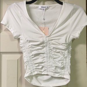 NWT SLINKY RUCHED FRONT TOP